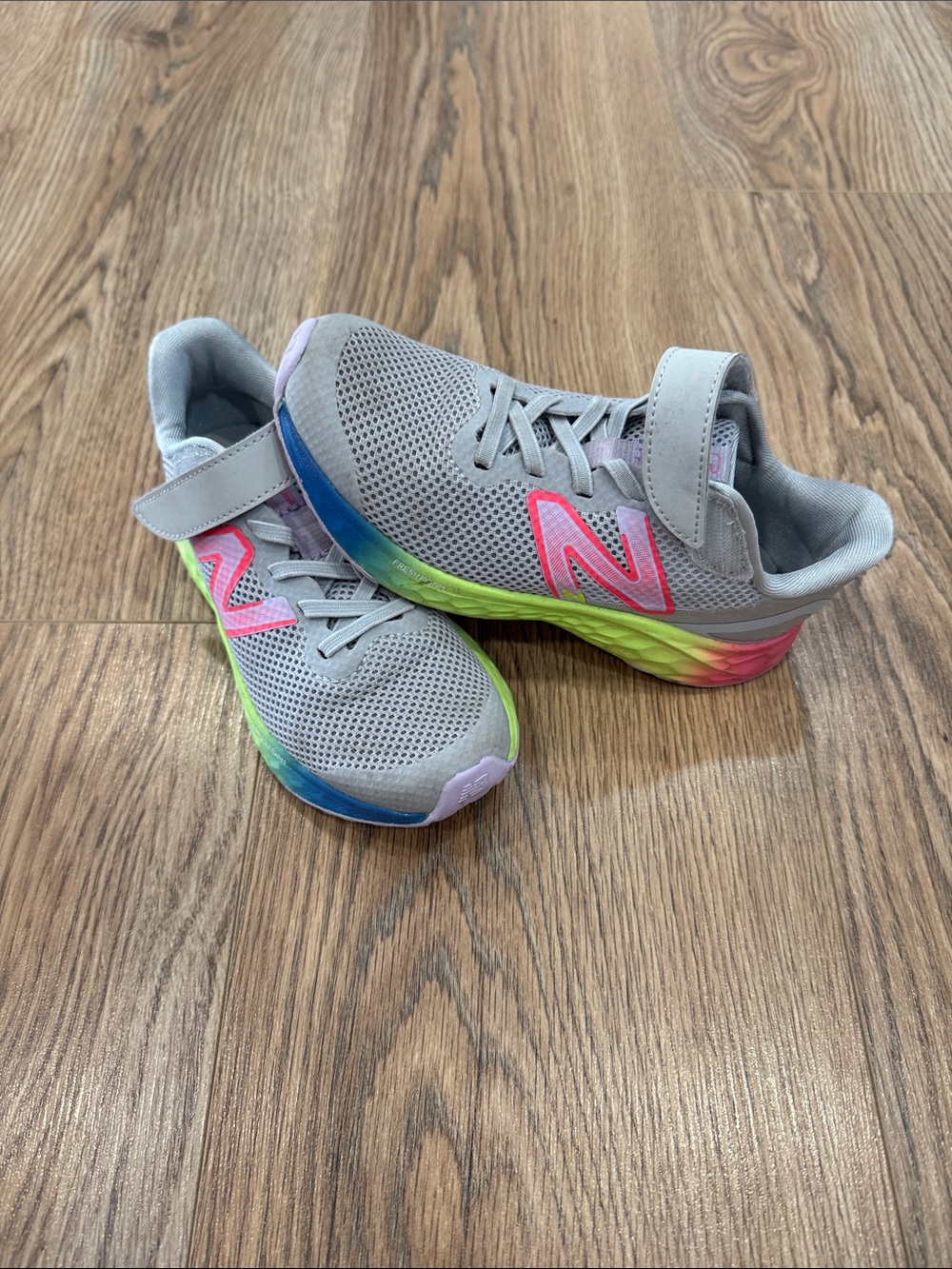 New Balance Gray girls Sneakers with Pink N and Rainbow Sole